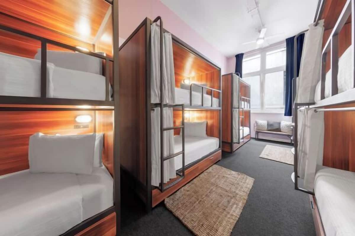 1 bedroom, blackout drapes, soundproofing, bed sheets