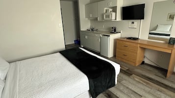 Comfort Room | Individually furnished, desk, laptop workspace, blackout drapes