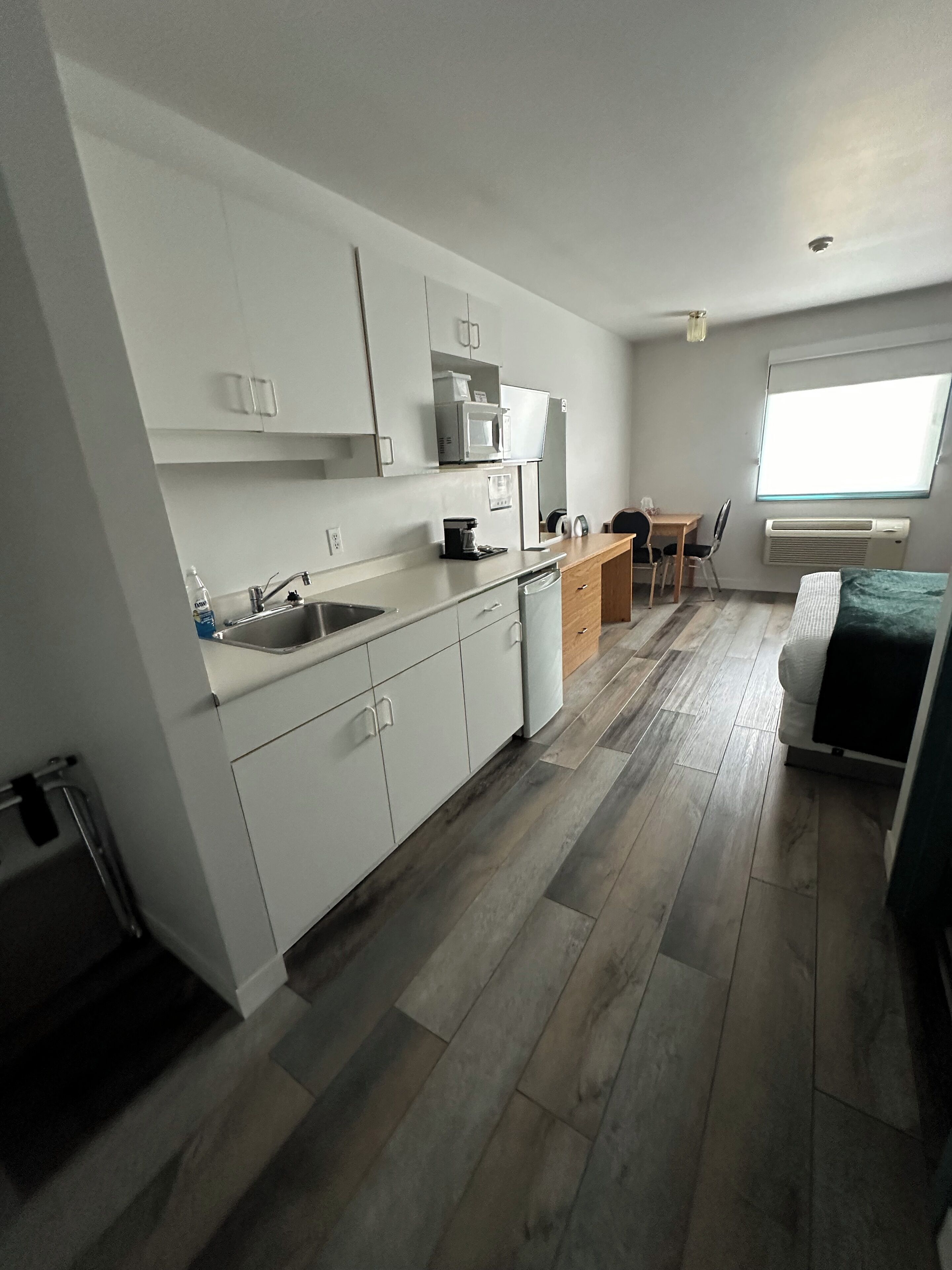 comfort room | individually furnished, desk, laptop workspace, blackout curtains