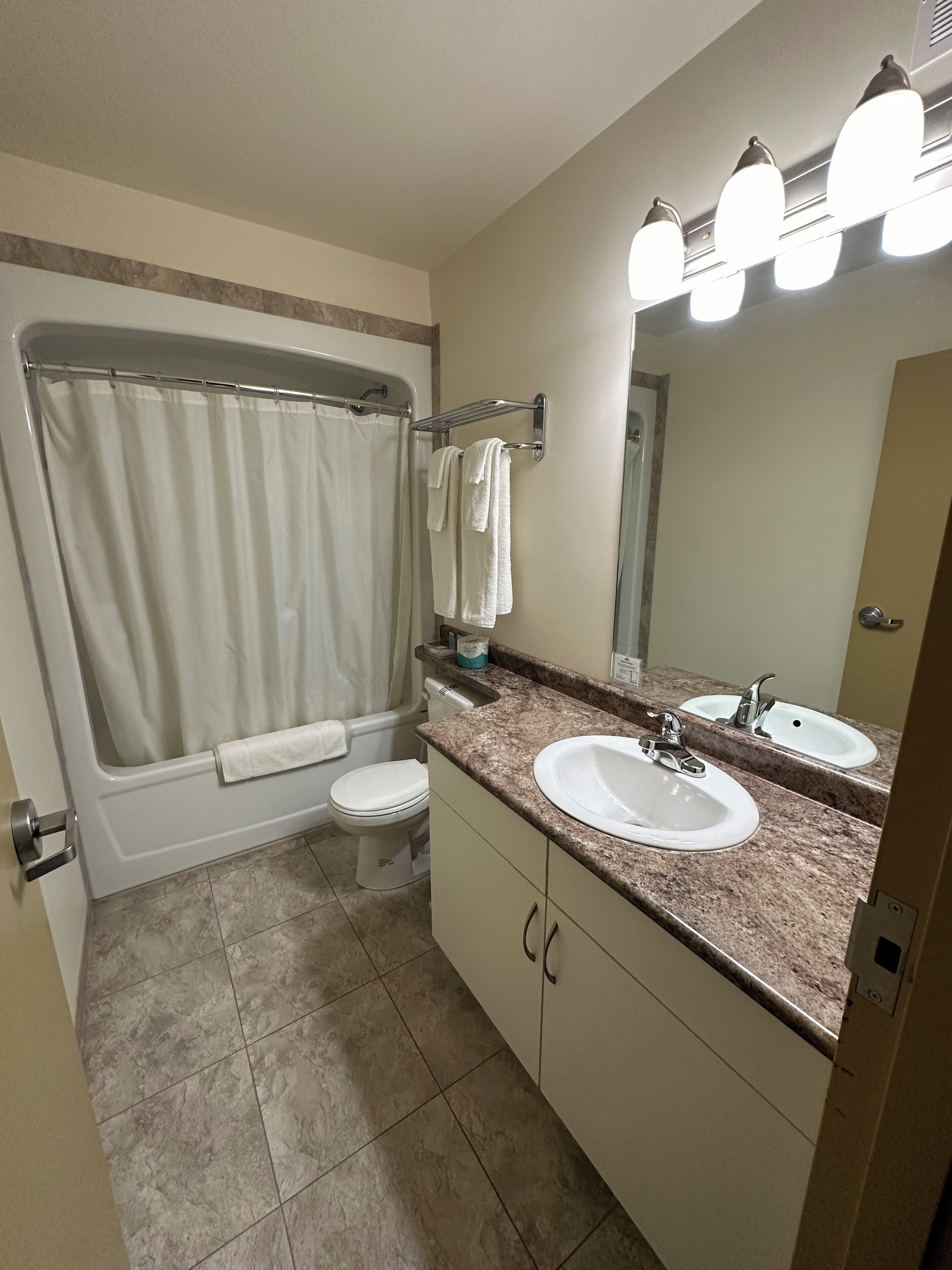 family room | individually furnished, desk, laptop workspace, blackout curtains