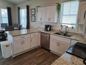 Fridge, microwave, oven, stovetop - New 4 Bed, 3 Bath, Pet-Friendly Home just minutes away from the beach. (North Topsail Beach)