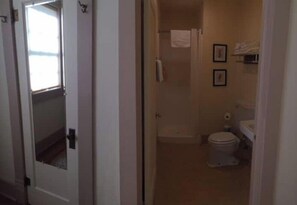 Combined shower/tub, towels, soap, shampoo