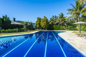 Indoor pool, 3 outdoor pools, open 7:00 AM to 8:00 PM, pool umbrellas