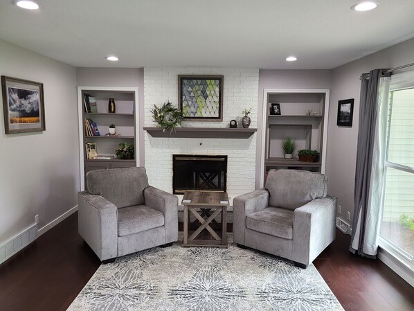 Smart TV, fireplace, books