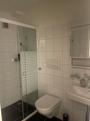 Shower, rainfall showerhead, towels