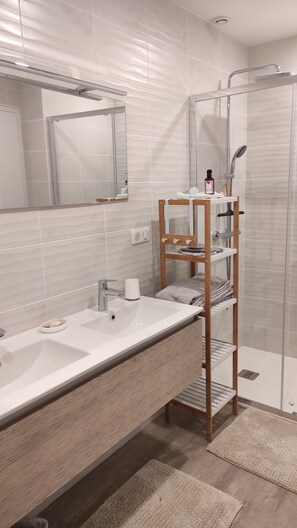 Shower, hair dryer, towels, soap