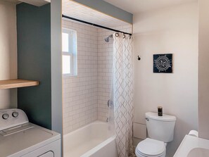 Combined shower/bathtub