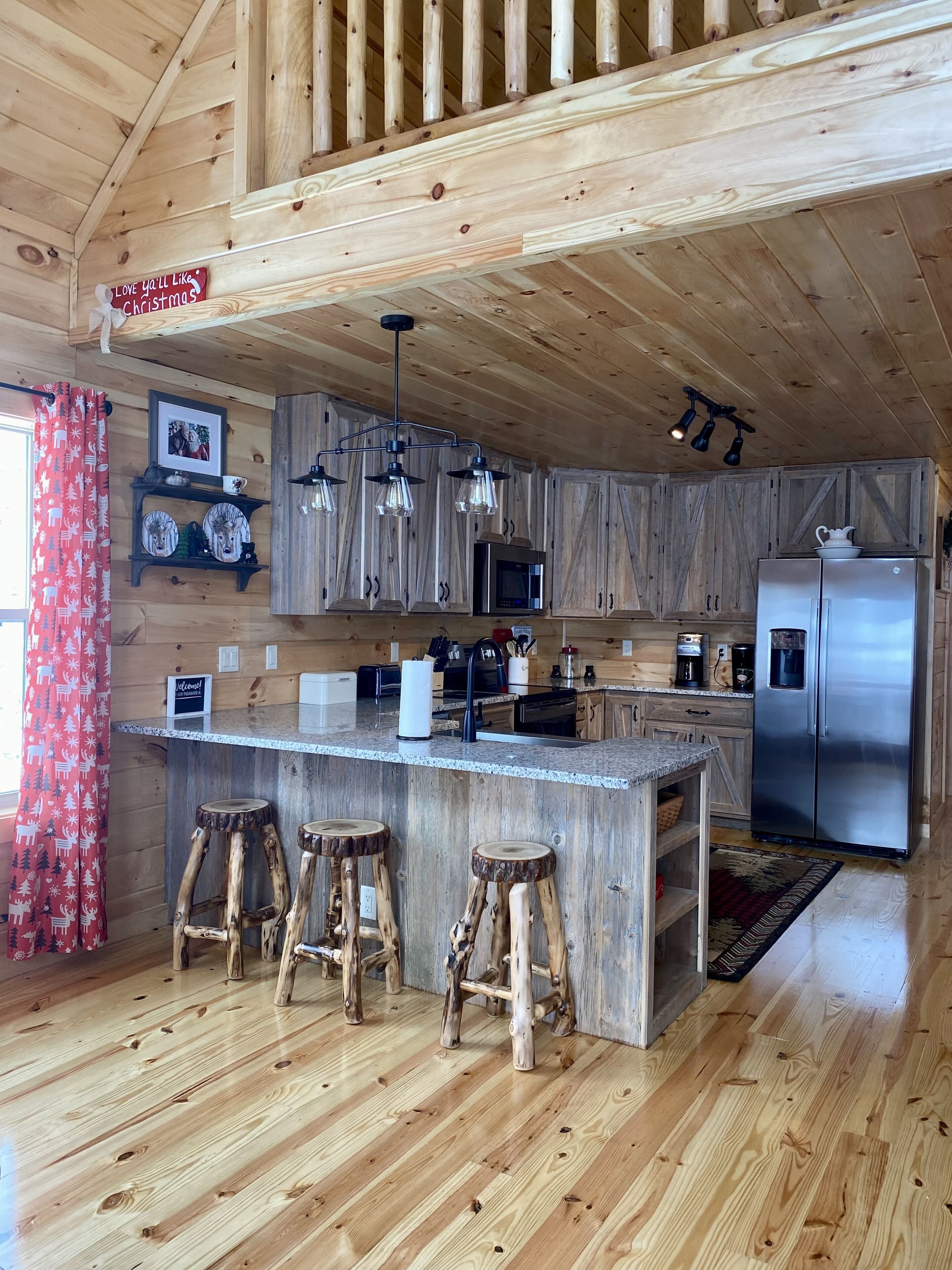 Large Modern Kitchen w/ custom made cabinets from local barn wood. 