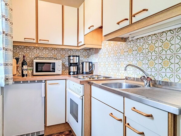 Microwave, oven, toaster, high chair