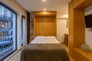 Desk, iron/ironing board, travel cot, free WiFi