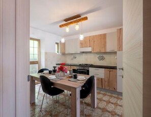Fridge, oven, cookware/dishes/utensils, dining tables - La Predaia by Interhome (Barcis Lake)