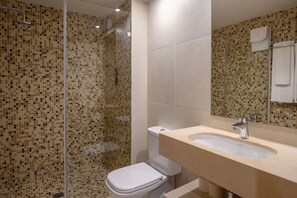 Bathtub, hair dryer, bidet, towels