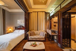 Quarto casal luxo | Área de estar