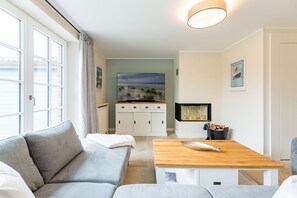 Fernseher, Kamin