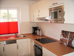 Imagen sin descripción, 5 de 13, botón