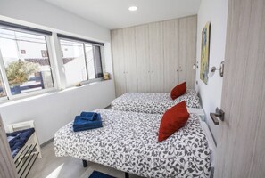 2 quartos, ferros/tábuas de passar roupa, Wi-Fi de cortesia