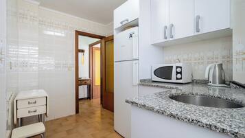 Fridge, microwave, oven, electric kettle