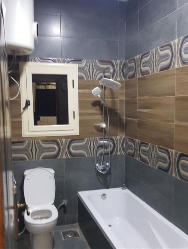 Badkar/dusch, hårtork, bidé och handdukar