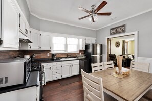 Dishwasher, coffee/tea maker, cookware/dishes/utensils