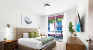 1 bedroom, desk, iron/ironing board, travel crib