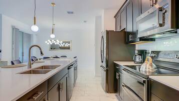 Oven, stovetop, dishwasher, coffee/tea maker