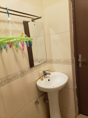 Shower, towels, soap, toilet paper