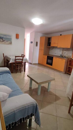 Apartment, 2 Queen-Betten | Wohnzimmer