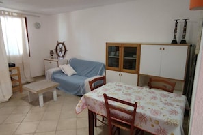 Apartment, 2 Queen-Betten | Wohnzimmer