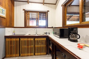 Fridge, microwave, stovetop, coffee/tea maker