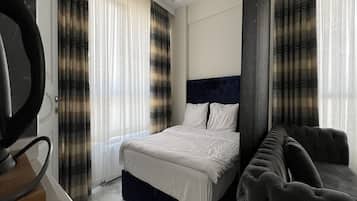 Ropa de cama de alta calidad, minibar y escritorio