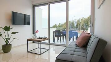 Estúdio superluxo | Área de estar | Smart TV 43 polegadas com canais digitais, TV