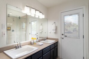 Combined shower/tub, hair dryer, towels, soap
