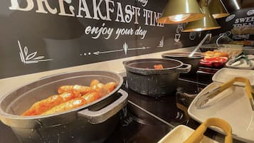 Desayuno buffet diario (GBP 13.95 por persona)