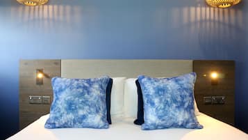 Literie hypoallergénique, surmatelas, coffres-forts dans les chambres