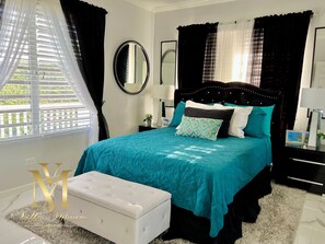 2 bedrooms, desk, iron/ironing board, travel crib