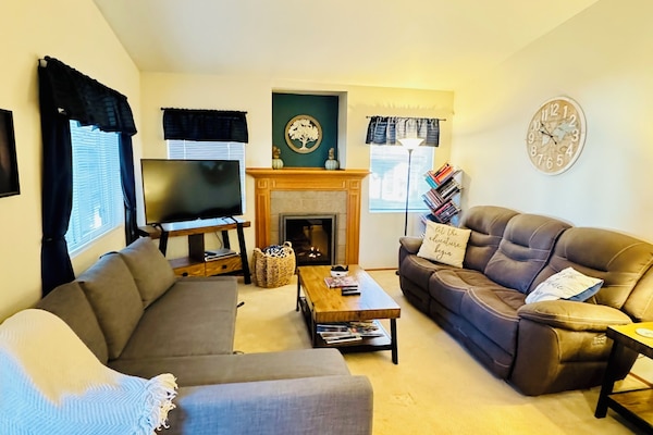 Pull out sofa bed in living room. Games and Book available for all day fun!