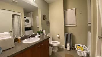Combined shower/tub, hair dryer, towels, soap