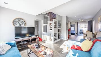 Smart TV, fireplace, foosball, books