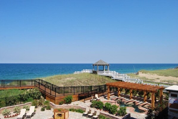 Terrace/patio - Beachfront Condo -- indoor/outdoor pool & private hot tub! (Kill Devil Hills)