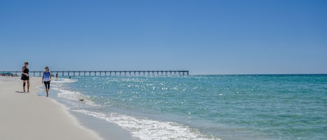 On the beach, sun-loungers, beach towels