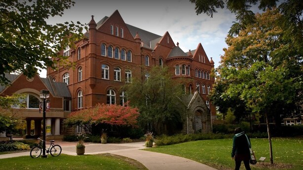 A large, historic building with multiple windows and a prominent tower. - Quaint Studio Space, right next to Macalester College, 5 miles uptown/downtown (Saint Paul)