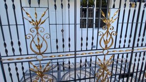 A gated area with decorative metalwork and a tiled floor. - Serenity's Condo 2 Bedroom Apartment (Montego Bay)