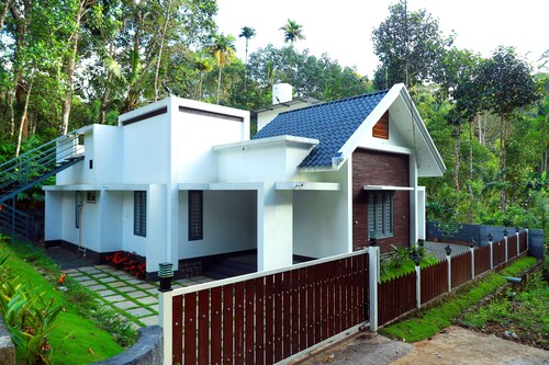 3 Bedroom Villa surrounded by Munnar's mesmerizing beauty of cascading mountains