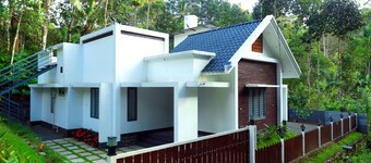 3 Bedroom Villa surrounded by Munnar's mesmerizing beauty of cascading mountains