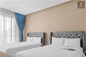 Studio | Een minibar, een bureau, beddengoed