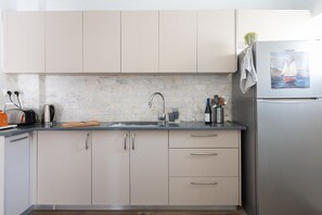 Apartment | Private kitchen | Fridge, oven, stovetop, dishwasher - Artistic Downtown Vibe Apt in Florentin (Tel Aviv)
