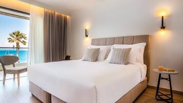 Family Room, 1 Bedroom, Sea View | In-room safe, desk, laptop workspace, blackout curtains