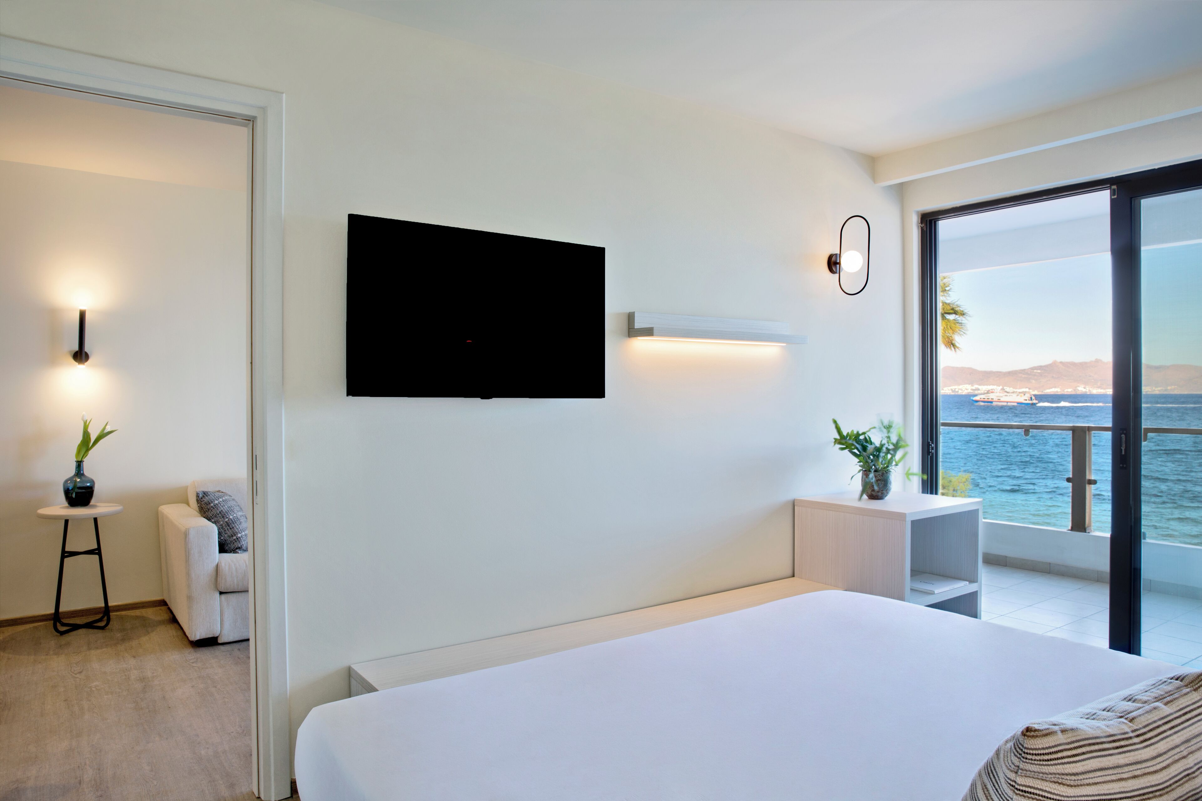 family room, 1 bedroom, sea view | 1 bedroom, in-room safe, desk, laptop workspace