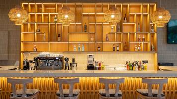 2 bars/lounges, 4 beach bars, poolside bar
