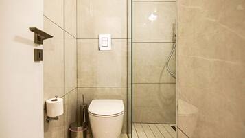 Executive Apartment | Bathroom | Shower, slippers